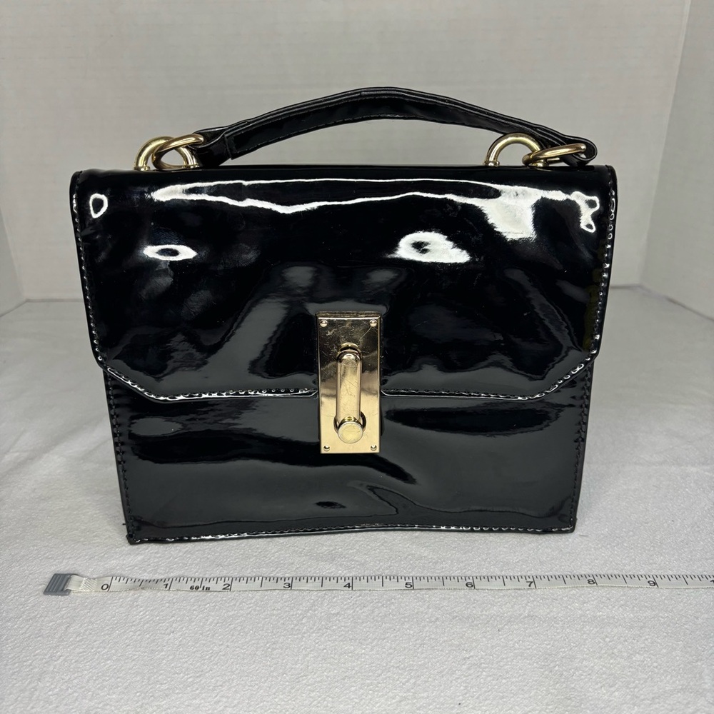 Olivia Miller Patent Black Top Handle Bag With Gold Hardware. Classicβ And Chic.